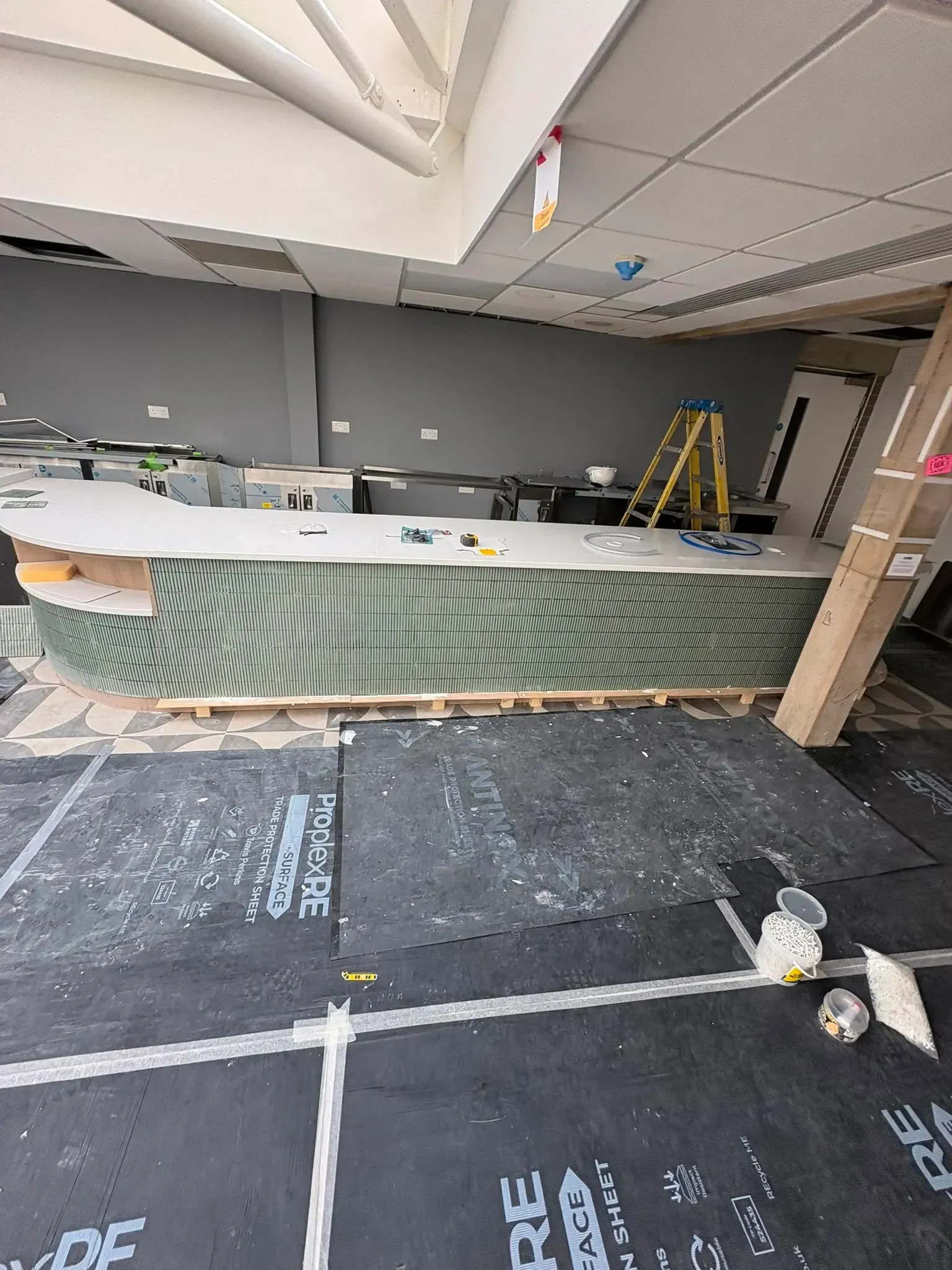 Curved bar counter under construction