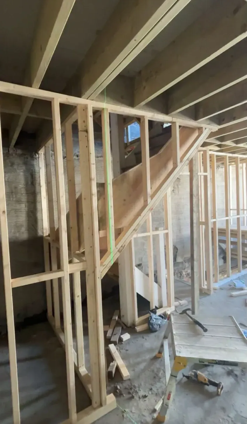 Boarded stud wall